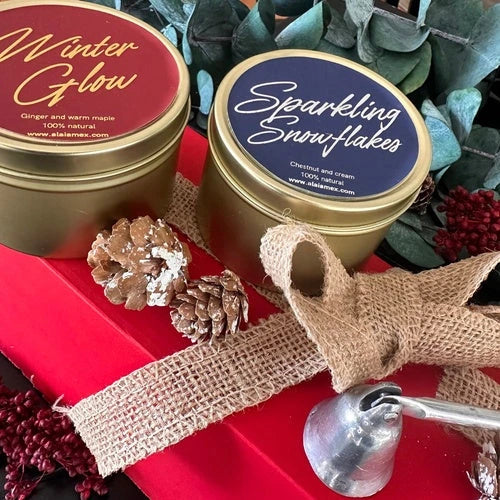 Velas Winter Glow y Sparkling Snowflakes de Alaïa en presentación navideña
